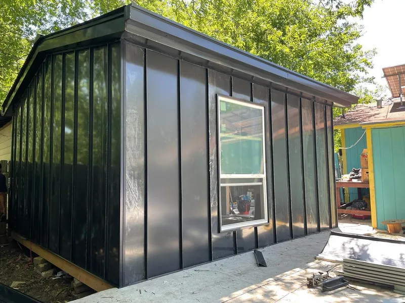 Black standing seam metal wall panels for Roof Inspection in Biloxi