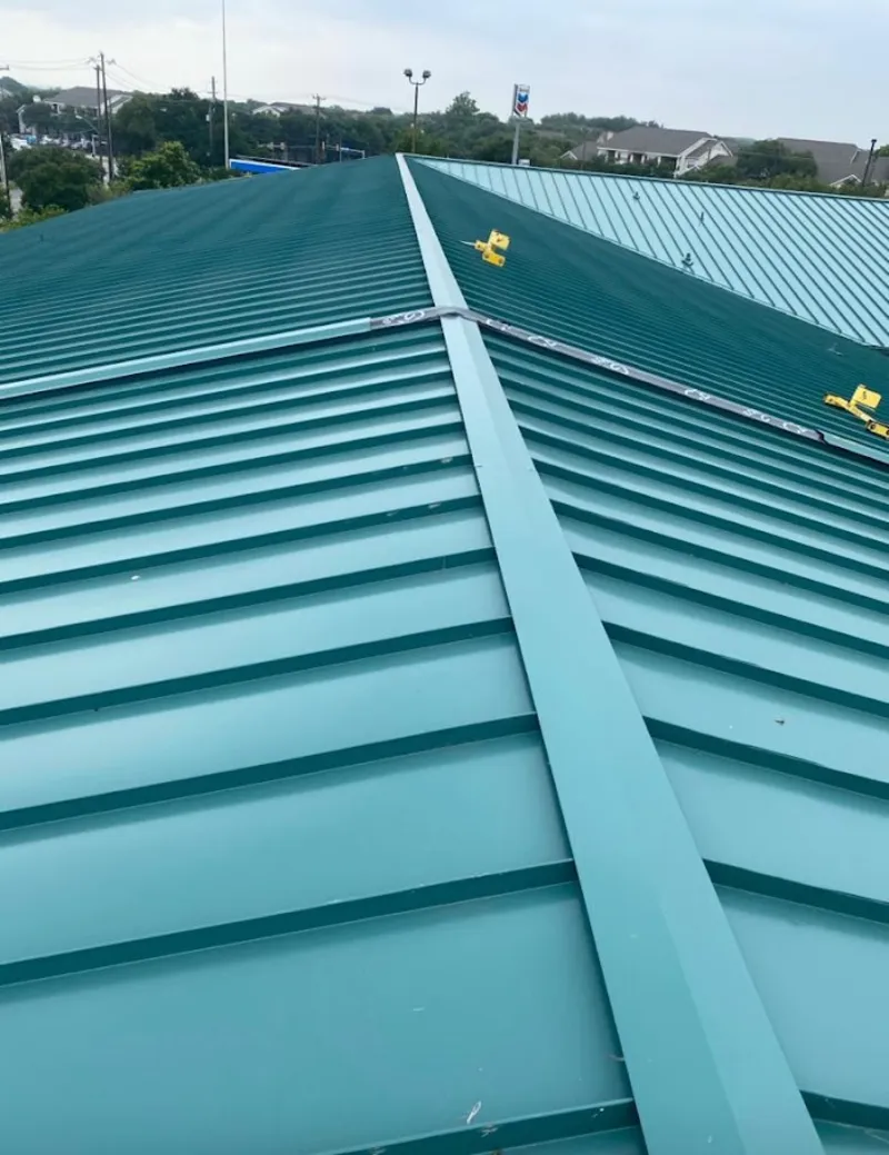 Green commercial metal roof ridge and valley for Metal Roof Repair in Biloxi